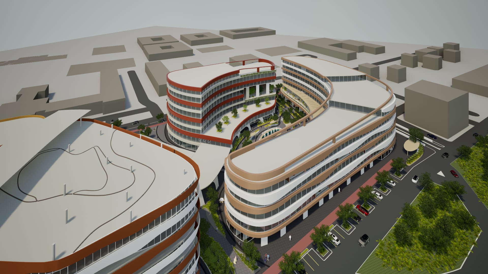 Aerial view of the Aera and Terra buildings: two curved banded blocks around a landscaped courtyard