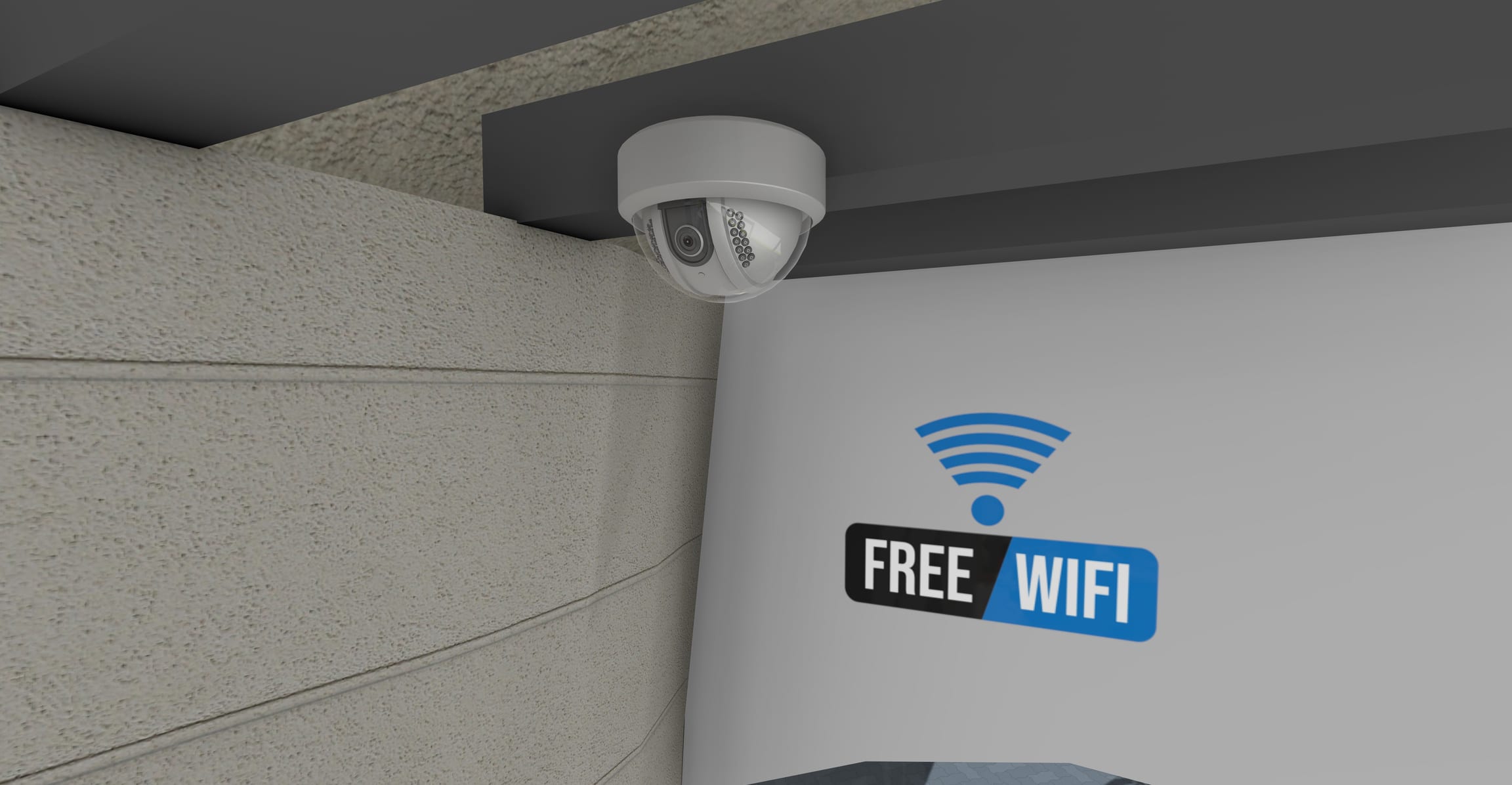 Dome CCTV camera under the ribbed ceiling beside the free Wi-Fi sign