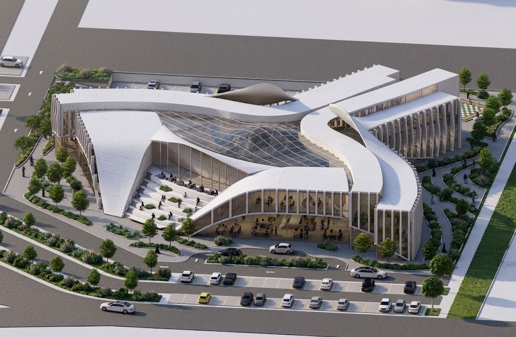 Aerial view of the library from the north-west with the three roof wings and amphitheatre courtyard